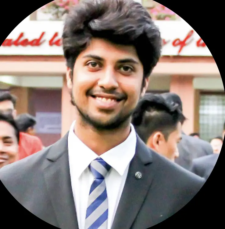 Smiling Individual In Suit