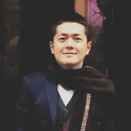 Smiling Man In Dark Scarf