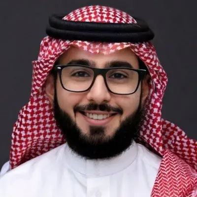 Smiling Man In Traditional Attire