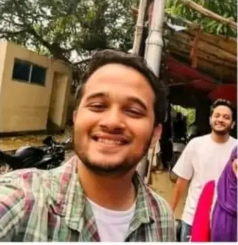 Smiling Person In A Group