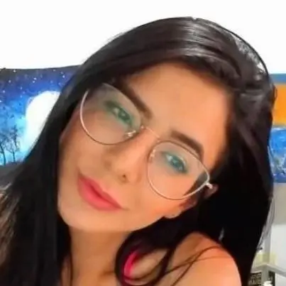 Smiling Person With Glasses