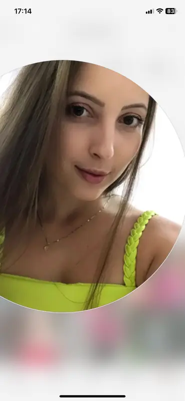 Smiling Woman In Yellow Top