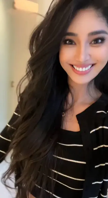 Smiling Woman Striped Sweater