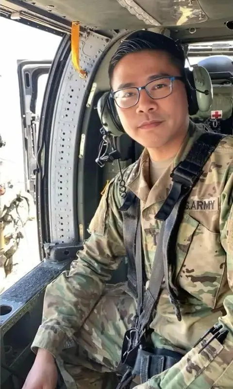 Soldier In Helicopter Cockpit