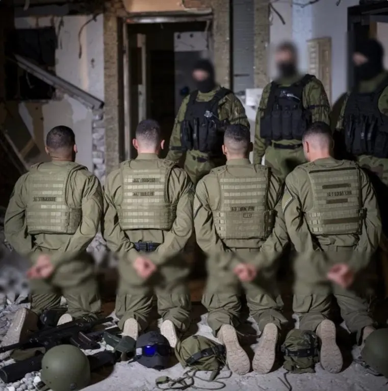 Soldiers Kneeling Indoors