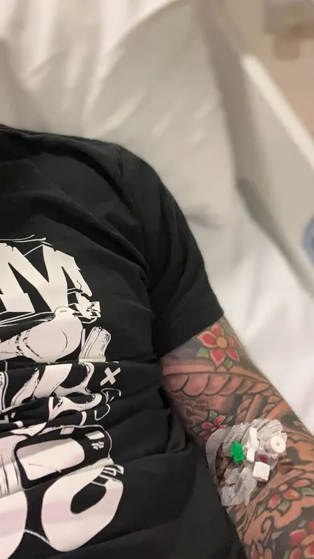Tattooed Patient In Hospital Bed