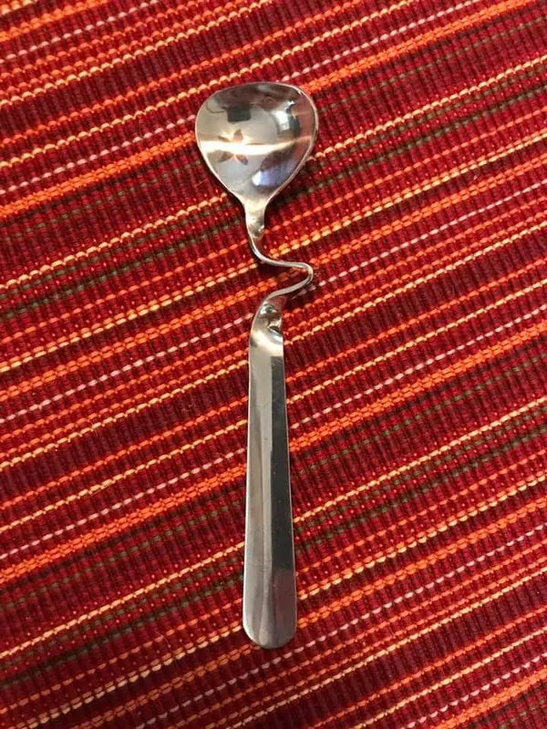 Twisted Spoon On Colorful Surface