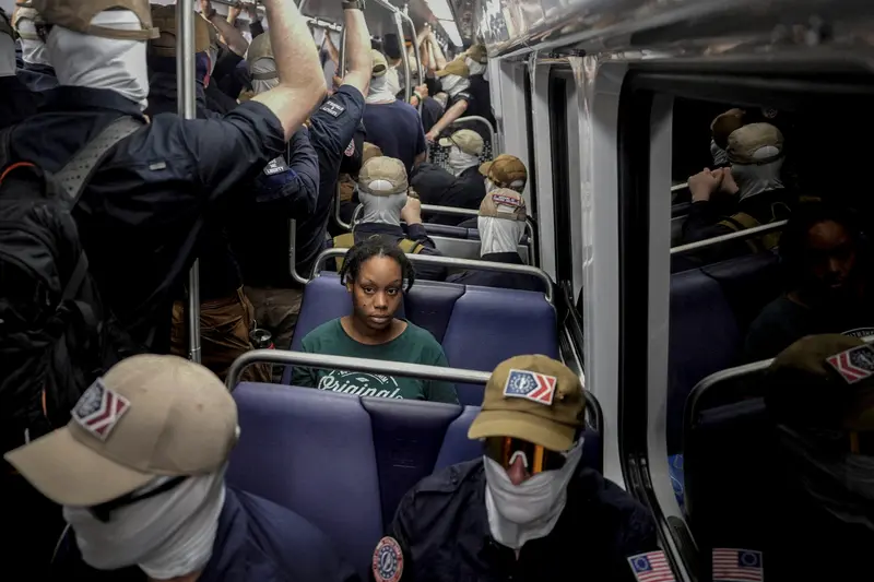 Woman and Masked Group on Train