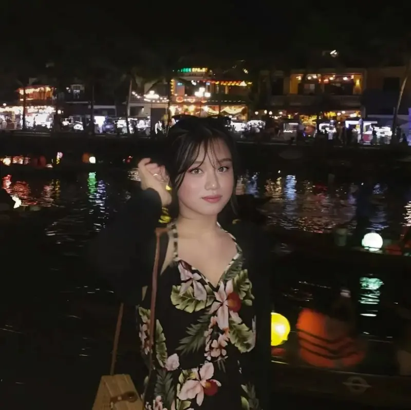 Woman At Night Market