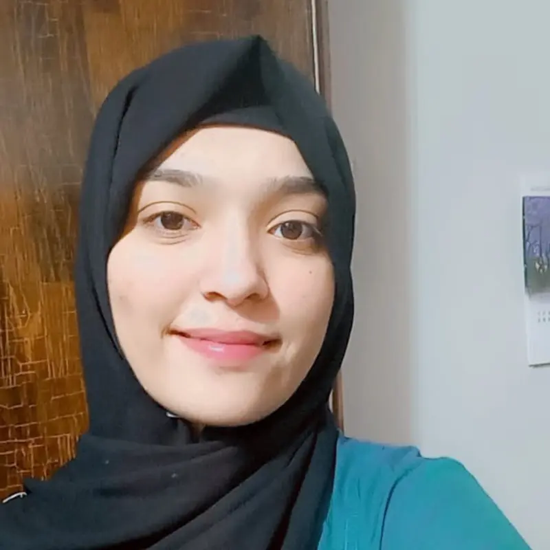 Woman In Black Headscarf Smiling