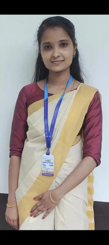 Woman In Sari With Badge