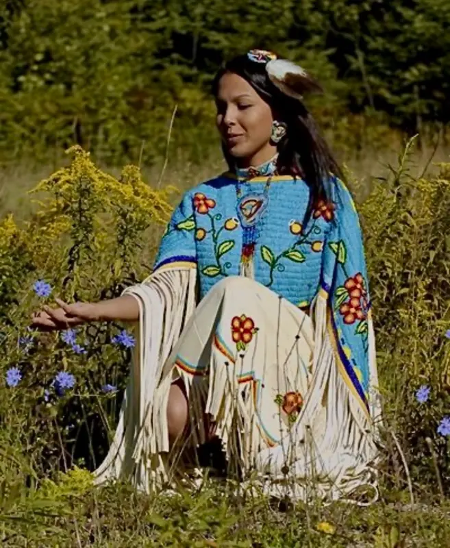 Woman In Traditional Attire Outdoors