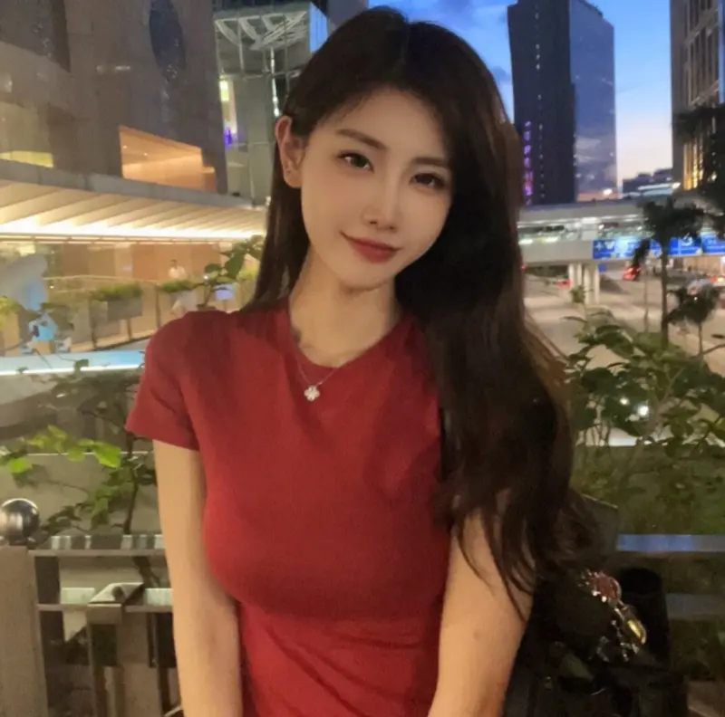 Woman In Urban Evening Pose