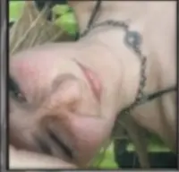 Woman Lying Wearing Necklace