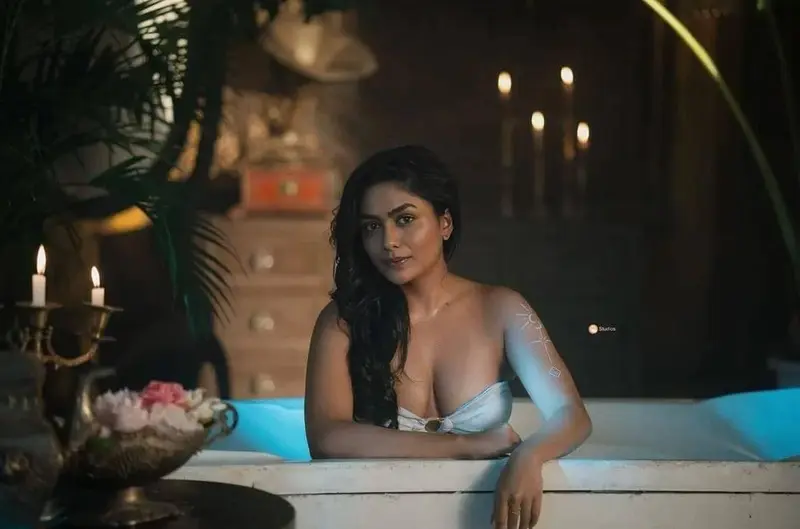 Woman Relaxing In Bathtub