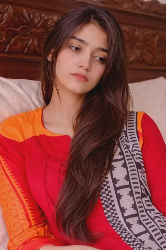 Woman Resting in Bed