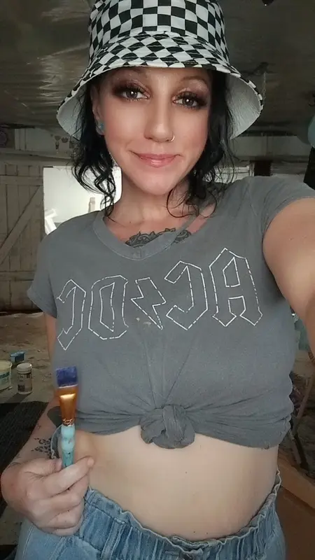 Woman With Hat And Paintbrush