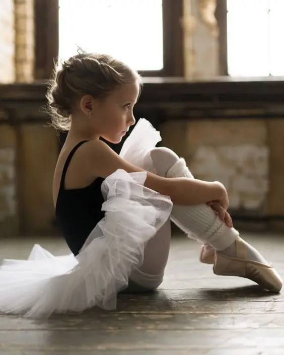 Young Ballerina On Floor