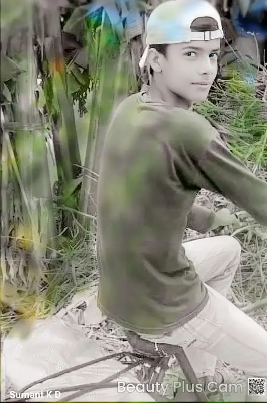 Youth Biking In Greenery