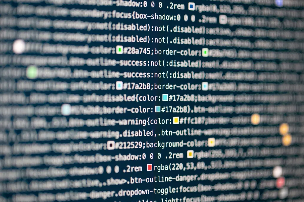 Lines of code and text on a dark screen, representing analysis of AI-generated writing